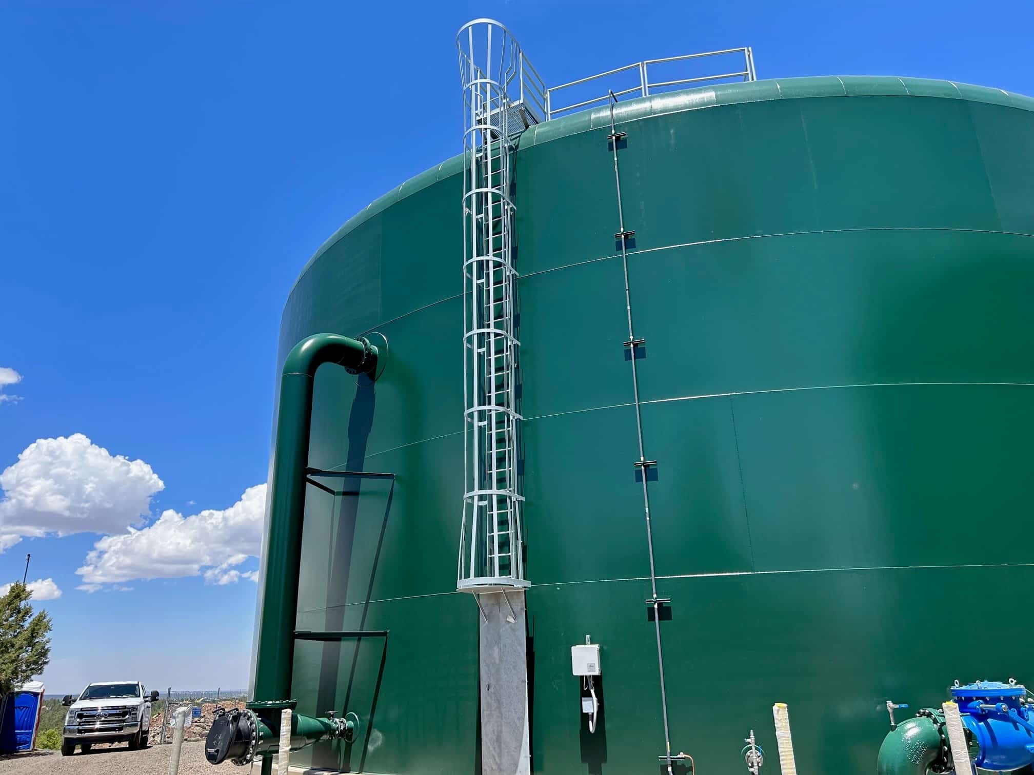 Glass-fused bolted steel storage tank with visible panel seams