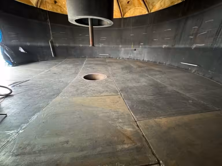 Welded steel water storage tank in San Diego — Oily Waste Tank Rebottom